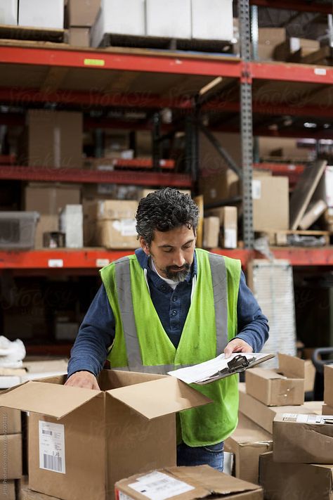 Caucasian male warehouse worker cheking inventory list in a distribution warehouse. Warehouse Photography, Corporate Photoshoot, Inventory List, Warehouse Worker, Corporate Videos, Furniture Factory, Sustainable Business, Photography Business, Food Photography