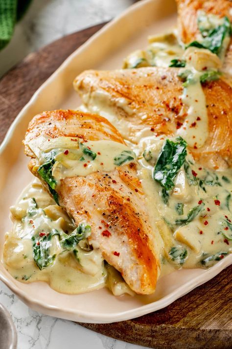 Creamy spinach artichoke chicken is a fast and easy one-pan dinner recipe brimming with briny artichokes, spinach, and lots of melty cheese. #spinachartichoke #chicken #chickendinner Creamy Spinach Artichoke Chicken, Gourmet Entrees, One Pan Dinner Recipes, Summer Chicken Recipes, Spinach Artichoke Chicken, Chicken Cooking, Artichoke Chicken, Artichoke Recipes, Gourmet Dinner