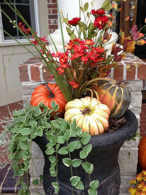 Jut did this I. Front of my house Wine Barrel Garden, Fall Urn, Fall Flower Pots, Natural Fall Decor, Fall Pots, Fall Yard Decor, Fall Container Gardens, Fall Decor Wreaths, Fall Table Centerpieces