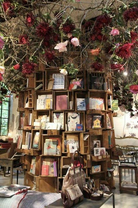 Cool, creative bookshelf idea: a tree-like wooden display! Books And Flowers, Lots Of Books, Spring Reading, Bookstore Cafe, Dream Library, Beautiful Library, Book Cafe, Home Libraries, Store Displays