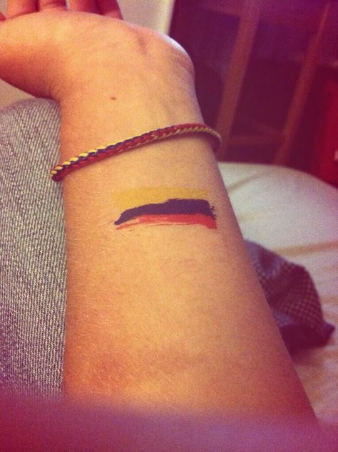 Colombian flag on wrist Colombian Flag Tattoo, Colombian Tattoos, Colombian Tattoo Ideas, Colombia Tattoo Ideas, Colombian Tattoo, Mexican Flag Tattoos, Skin Tear Tattoo, Colombia Tattoo, American Flag Sleeve Tattoo