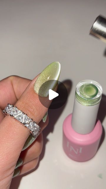 LN Nailed It on Instagram: "The most velvety cat eye. Been obsessed with our new magnetic colors! Perfect green for spring but I would say but it over milky white instead of nude 😉🫶🏻 𝐀𝐋𝐋 𝐏𝐑𝐎𝐃𝐔𝐂𝐓𝐒 𝐅𝐑𝐎𝐌 𝐍𝐍𝐀𝐈𝐋𝐄𝐃𝐈𝐓.𝐂𝐎𝐌  - MAGNETIC GEL 16 - HEAVY DUTY MAGNET  - DISCO GEL 26 - NO WIPE TOP COAT  . . . .  #nails #nailstyle #nailsdesign #nailslove #nailsalon #nailsmagazine #nailsonpoint #nailsoftheweek #nailporn #gelnail #nailsnailsnails #nailartlove #naildesigns #nailsdid #nailpro #naillove #acrylicnails #nailsonfleek #instanail #beautynails #nailselfie #naildesign #nailstagram #nailsofinstagram #nailsart #instanails #gelnails #nailsoftheday #nail #nailart" Lime Green Cat Eye Nails, Milky White Cat Eye Nails, Green Magnetic Nails, Peridot Nails, Magnetic Nails Design, Magnetic Nail Polish Designs, Green Cat Eye Nails, Magnet Nails, Nail Polish Art Designs