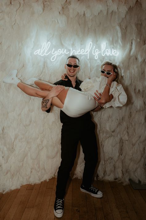 bride and groom in front of feather wall backdrop Feather Wall Wedding, White Feather Wall Backdrop, Feather Boa Backdrop, Feather Photo Backdrop, Feather Wall Backdrop, Mammoth Wedding, Feather Backdrop, Winter Gala, Balloons Backdrop