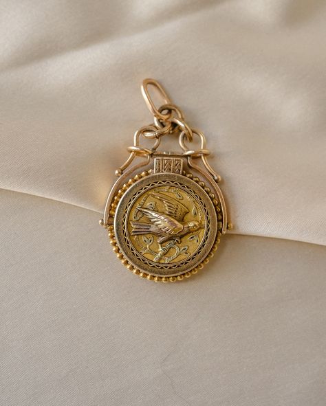 Part 2/2 of our locket feature 🦢 Antique 14k Soaring Bird Swivel Locket This antique 14k gold locket pendant, dating back to circa 1890, features a charming bird on one side and a detailed shield on the other. Measuring 1.65 inches from the top of the bail to the bottom (when closed) and 0.9 inches wide, this piece is in good condition and closes securely. A timeless keepsake that beautifully combines artistry and history. See the link in our story to see the website item and DM for... Antique Adjustable Engraved Locket Necklace, Antique Engraved Adjustable Locket Necklace, Antique Gold Engraved Locket Necklace Collectible, Ornate Engraved Brass Locket Necklace, Victorian Brass Locket Necklace For Keepsake, Gold Locket, Happy Mail, Locket, Design Inspiration