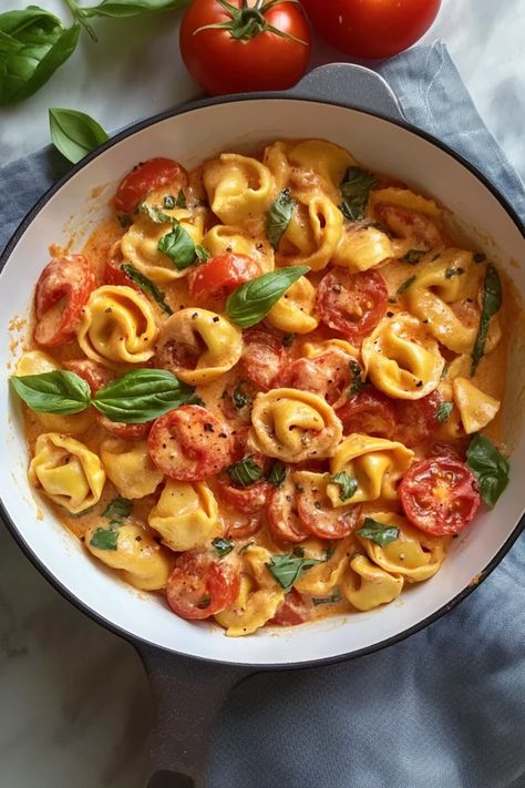 This one-pot creamy tortellini with tomatoes is as simple as it is delicious. With minimal cleanup and maximum flavor, it's a go-to recipe for those busy nights when you want a rich, cheesy dinner without the hassle.  Save this quick and easy recipe for busy days  #OnePotTortellini #CreamyPasta #TomatoTortellini #EasyMeals #CheesyPasta #QuickDinner #ComfortFood #WeeknightRecipe #MinimalCleanup #ItalianFlavors Tortellini Recipes Tomato Sauce, Tortellini With Tomatoes, Dinner With Grape Tomatoes, Easy Tortellini Recipe, Turkey Tortellini Recipes, Garlic Butter Tortellini, Tortellini Healthy Recipes, Tricolor Tortellini Recipes, Vodka Tortellini Recipes