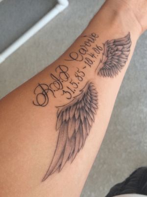 Top 10 Original Forearm RIP Tattoo Designs to Remain Your Sweet Memories Rip Tattoos Ideas, Tattoo For Brother And Sister, Angel Wing Tattoo Memorial, R.i.p Tattoos For Men, Tattoo For Brother, Rest In Peace Tattoos, Grave Tattoo, Wing Tattoo Ideas, Rip Tattoos For Dad