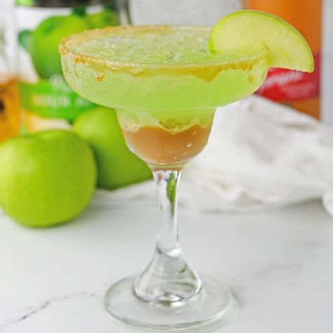 Caramel Apple Margarita Caramel Apple Drinks Alcohol, Candy Apple Margarita, Caramel Apple Cocktail Drink Recipes, Caramel Apple Margarita, Fall Apple Margarita, Sour Apple Margarita, Caramel Apple Pie Drink Alcohol, Baked Apple Cheesecake, Apple Margarita