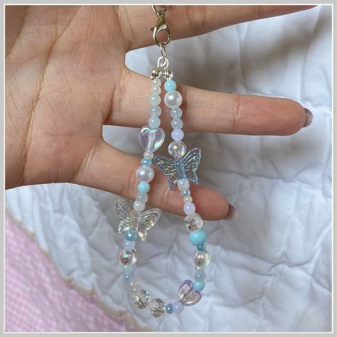 Get the perfect ring to complete your outfit on Amazon. Blue Phone Strap Beads, Cute Keychain For Backpacks, Beads Charm Phone, Phone Keychain Beads Aesthetic, Blue Phone Charm Ideas, Phone Charm Keychain, Charms For Bracelet, Phone Charms Aesthetic Blue, Phone Key Chain