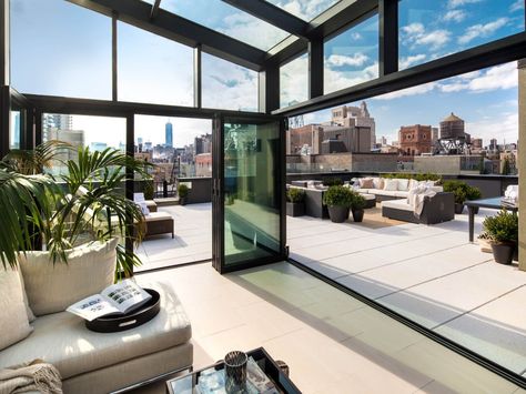 Manhattan penthouse rooftop deck with all-glass three-season room Penthouse Rooftop, Apartment Rooftop, Greenwich Village Apartment, Manhattan Penthouse, Three Season Room, Black Rooms, Glass Room, Wolf Of Wall Street, Terrace Design