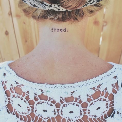 Freed. Girls neck tattoo typewriter font small word Jesus tattoo God church Christian freedom ink free simple Tattoo Typewriter, Typewriter Font Tattoo, Tattoo God, Tattoo Christian, Girl Neck Tattoos, Tier Tattoo, Church Christian, Jesus Tattoo, Tattoo Simple