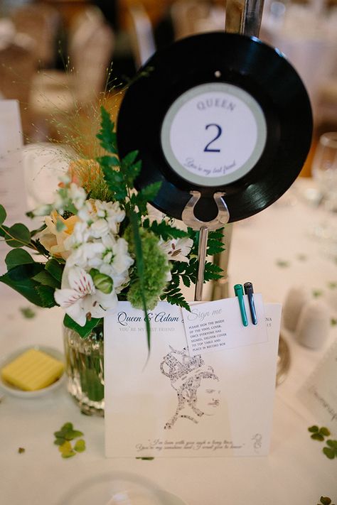 42 Brilliant Wedding Table Name Ideas | OneFabDay.com Wedding Table Name Ideas, Table Name Ideas, Christmas Wedding Table, Wedding Table Name, Funky Wedding, Music Themed Wedding, Wedding Table Names, Table Name, Disco Fever