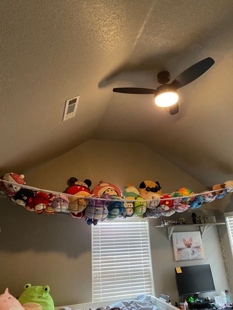 Used a volleyball net to display/store my daughter’s Squishmallow collection Cute Ways To Store Squishmallows, Squishmallow Hanging Net, Net For Squishmallows, Plush Net Ideas, Big Squishmallow Storage, Stuffie Display Ideas, Squishmallow Storage Net, Squish Mellow Net, Squishmallow Net Storage