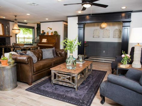 Suburban '70s House Turned Into a Romantic Retreat 3 Black Trim And Doors, Trim And Doors, Fixer Upper Homes, Fixer Upper Living Room, Brown Couch Living Room, 70s House, Rustic Retreat, Chip And Joanna Gaines, Brown Living Room