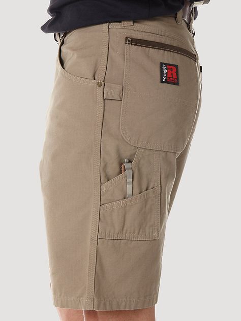 FEATURE-PACKED CARPENTER SHORTSThese carpenter shorts feature tough, durashield contruction with Cordura lined back pockets, helping them stand up to whatever you put them through. The utility loop, tool pockets and action gusset allow you to move and tackle all of the work you need to get accomplished. These carpenter shorts have a 10.5 inseam. Carpenter Shorts, Wrangler Shorts, Dark Khaki, Men's Shorts, Stand Up, Quick Saves