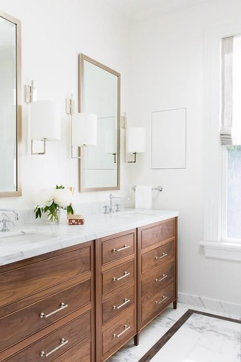 You'll feel right at home in this lovely brown bathroom fitted with a stained oak dual washstand finished with nickel pulls and a white marble countertop holding his and her sinks beneath polished nickel faucets. White Double Vanity Bathroom, White Double Vanity, Rustic Bathroom Designs, Bad Inspiration, Brown Bathroom, Master Bath Remodel, White Marble Countertops, Double Vanity Bathroom, Wood Bathroom