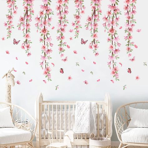 PRICES MAY VARY. PREMIUM MATERIAL: These hanging flowers wall stickers are made of self-adhesive PVC material, safe and non-toxic, durable and waterproof, can be applied with your confidence; The colors are bright and long-lasting, not easy to fade and can keep gloss for a long time; And stickers also feature with strong adhesive, which are not easy to fall, making your home beautiful and eye-catching. REATIVE DESIGN: The hanging pink flowers vines and beautiful butterflies form a spring scene. Nursery Wall Flower, Wall Decals For Pink Wall, Flower Decals Toddler Room, Animals And Flowers Nursery, Rose Nursery Theme Pink, Lilly Flower Themed Nursery, Wildflower Nursery Theme, Pink Flower Nursery