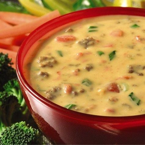 Queso dip recipe with ground beef crumbles and green onions added to cheese and zesty tomatoes for a dip never to be retired.  Velveeta® and Kraft® are registered trademarks of Kraft Foods, Inc.  Ro*Tel® is a registered trademark of ConAgra Foods RDM, Inc. Superbowl Party Food Easy, Cheeseburger Dip, Rotel Dip, Queso Dip Recipes, Grilling Menu, Velveeta Cheese, Recipes Chocolate, Queso Dip, Superbowl Party Food