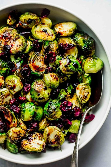 Roasted Balsamic Brussel Sprouts with cranberries is a simple side dish recipe that both kids and adults love! They're crispy and delicious. I get asked to make this dish every year for Thanksgiving and Christmas! // roasted oven // baked // oven // easy // vegan // best Brussel Sprouts With Cranberries, Thanksgiving Brussel Sprouts, Balsamic Glaze Brussel Sprouts, Roasted Brussels Sprouts With Balsamic, Cranberry Recipes Thanksgiving, Brussel Sprout Recipes, Vegan Thanksgiving Side Dishes, Baked Brussel Sprouts, Balsamic Brussel Sprouts