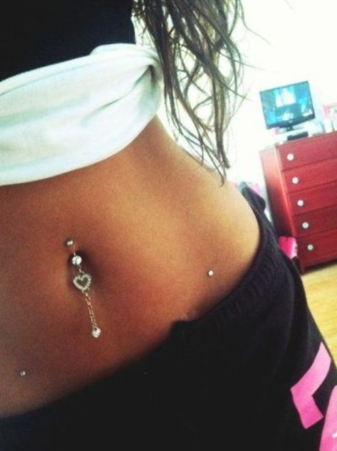 piercings, don't like the one at the bellybutton, but the two dermals are awsome :) Hip Dermal Piercing, Back Dimple Piercings, Hip Piercings, Dimple Piercing, Button Ideas, Smiley Piercing, Barbell Piercing, Bloated Belly, Dermal Piercing