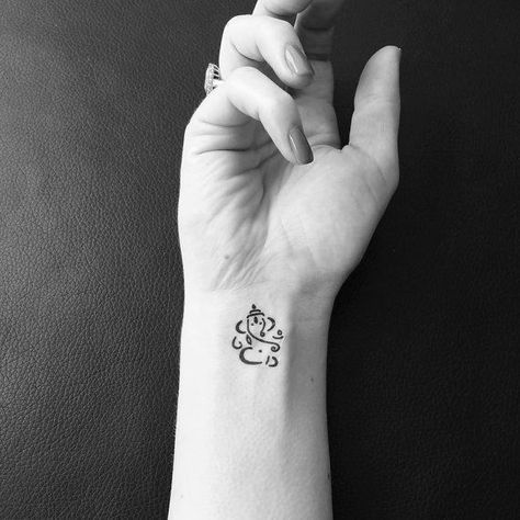 Small lord Ganesha tattoo Abstract Ganesha, Hindu Tattoos, Band Tattoos For Men, Trishul Tattoo Designs, Ganesh Tattoo, Om Tattoo Design, Hindu Tattoo, Ganesha Tattoo, Shiva Tattoo Design