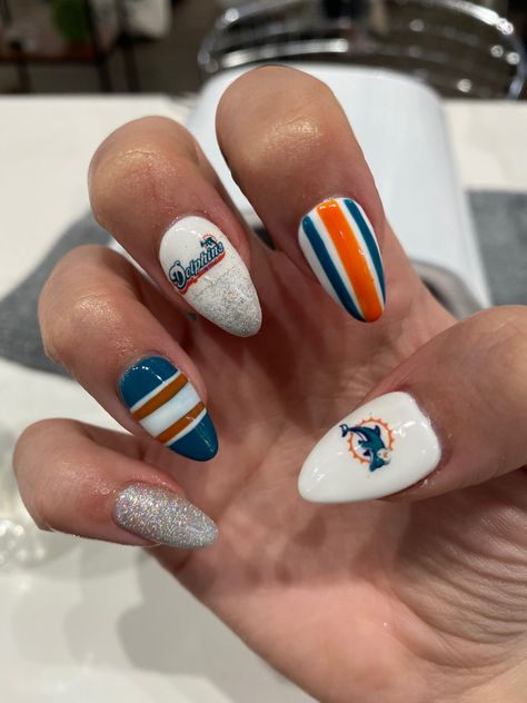 Miami dolphins acrylic sports nails. Nfl. Football. Miami Dolphin Nails, Dolphins Nails, Miami Dolphins Nails, Dolphin Nails, Nfl Dolphins, Dolphins Football, Funky Nails, Miami Dolphins, Rock Painting