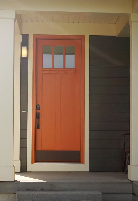 Battleship Gray  Creamy Beige with Pumpkin door Front Door Grey House, Wine Doors, Orange Doors, Orange Front Door, Ranch Renovation, Orange Front Doors, Siding Ideas, Ranch House Exterior, Orange Door