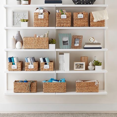 Beach House Storage, White Shelf, Baskets For Shelves, Small Space Organization, The Container Store, George Nelson, Basket Shelves, Water Hyacinth, Declutter Your Home