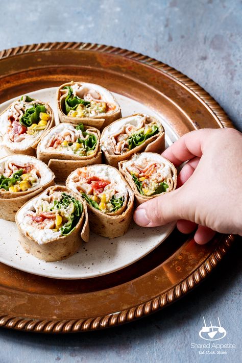 Grabbing a pinwheel of the Southwest Turkey Wraps | sharedappetite.com Wrap Recipes For Lunch, Hummus And Veggies, Healthy Wraps For Lunch, Low Calorie Wraps, Wraps For Lunch, Veggie Hummus Wrap, Salat Wraps, Turkey Wrap, Vegetarian Wraps