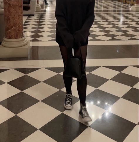 black leggings black converse moody outfit inspo holding purse gothic Black Converse And Tights, Black Tights And Converse Outfit, Converse And Tights, Converse With Tights, Tights With Converse, Black Converse Aesthetic, Converse Aesthetic, Tight Black Dress, Tights Fashion