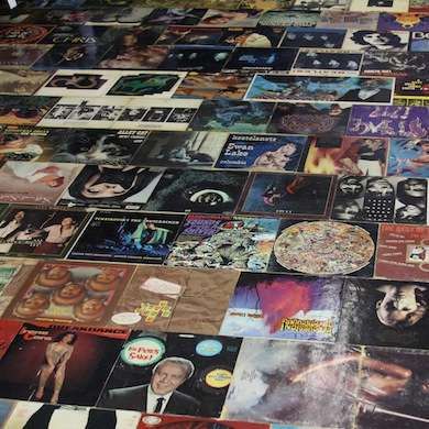 Album covers can be laid out as floor tiles for an eye-popping effect in a rec room, basement or music room. Lay them down with adhesive and apply several coats of oil-based polyurethane on top for protection. It’s a conversation starter that will keep guests talking all night. Diy Album Covers, Cheap Hardwood Floors, Paper Bag Flooring, Alternative Flooring, Cheap Flooring, Attic Room, Attic Renovation, Attic Storage, Attic Remodel