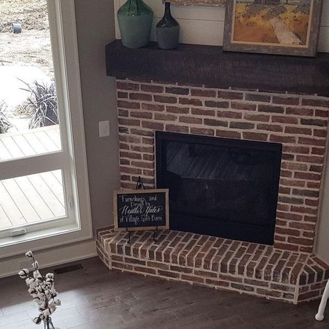 Heather Yates Interiors on Instagram: "It's almost the weekend! And we spring forward- which means..spring is right around the corner 🙌🏻 . We did a corner fireplace with a mortar wash to give it added texture and the mantel we used reclaimed wood. I wanted to create a casual space in this room since it's open to the kitchen area - perfect for entertaining guests! . . #modernfarmhouse #casualgreatroom #greatroom #farmhousedecor #homedecor #casualfarmhouse #openfloorplan #highceilings #brick #mortarwash #brickfireplace #cornerfireplace #reclaimedwood #mantel #seating #entertaining #heatherhatesinteriors" Brick Corner Fireplace, Corner Brick Fireplace, Corner Brick Fireplaces, Mortar Wash, Farmhouse Addition, Brick Hearth, Spring Forward, Corner Fireplace, Fireplace Makeover