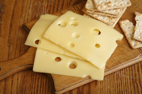 Find out how the holes in Swiss cheese are made Winter Vitamins, Easy Protein Sources, Cheese With Holes, Lactose Free Cheese, Warm Appetizers, Cheese Cave, Vitamin D Foods, Cheese Factory, Cheese Shop