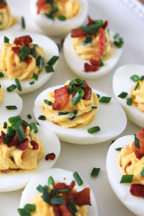 Loaded Deviled Eggs are fully loaded with cheddar cheese, bacon, chives, and horseradish mustard. You will want to serve them at every holiday and party! Jalapeño Deviled Eggs, Loaded Deviled Eggs, Deviled Eggs Recipe Best, Spicy Deviled Eggs Recipe, Horseradish Mustard, Jalapeno Deviled Eggs, Spicy Deviled Eggs, Bakery Style Blueberry Muffins, Classic Deviled Eggs