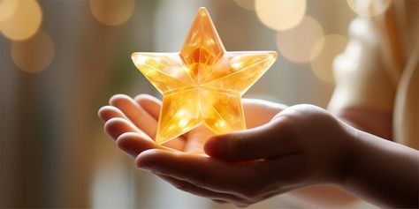 Photo two hands holding a shining star | Premium Photo #Freepik #photo Two Hands Holding, Sustained Investigation, Pose Practice, Folded Hands, Hands Holding, Sketchbook Ideas, Star Images, Shining Star, Premium Photo