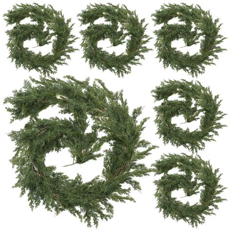 PRICES MAY VARY. What Can You Get: 6 pieces of 9ft long Christmas cedar garland, sufficient amount and length to meet your home or outdoor decoration needs, creating an intense festive atmosphere for your home Infuse a Festive Feeling: the leaves are layered so that the Christmas greenery garland looks layered and charming, full of the breathing of Christmas, will add charm to your house during the Christmas season Proper Size: each cypress garland artificial realistic is about 72 inches/ 183 cm Christmas Garland Staircase, Outdoor Christmas Garland, Porch Garland, Archway Decor, Fireplace Table, Cypress Vine, Minimalist Holiday Decor, Cedar Garland, Classy Christmas Decor