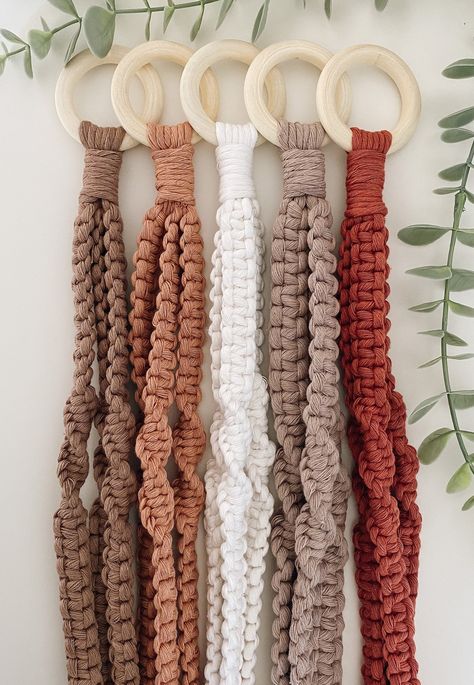 Give your space some color with these muted handmade macrame plant hangers.  You just need to add some greenery!  Proudly made in Canada Lengths of each hanger is measured with NO pot from wooden ring to gathering knot. Please keep in mind these are handmade...tassel lengths and gathering knots will vary to help reduce waste  **Also note there is no tracking number with this shipment ** Thank you and please don't hesitate to ask me any questions! -Destinee Macrame Photography, Decorative Knots, Boho Crafts Diy, Macrame Knots Pattern, Plant Decor Indoor, Macrame Plant Hangers, Macrame Ideas, Macrame Decor, Macrame Knots