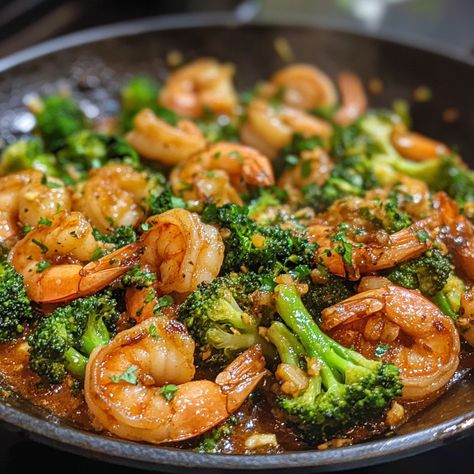 Shrimp and Broccoli Stir Fry in Garlic Sauce 🍤🥦 Ingredients: For the Stir Fry: 1 lb large shrimp, peeled and deveined 2 cups broccoli florets 2 tbsp vegetable oil 1 red bell pepper, thinly sliced (optional) 1 tbsp sesame seeds (for garnish) For the Garlic Sauce: 4 cloves garlic, minced 1/4 cup soy sauce 2 tbsp oyster sauce 1 tbsp honey or brown sugar 1 tbsp cornstarch 1/4 cup water 1 tsp sesame oil 1/2 tsp red pepper flakes (optional, for heat) Instructions: Prepare the Sauce: In a small bowl... Cooking Mama, Cheap Food, Shrimp And Broccoli, Broccoli Stir Fry, Food Rules, Large Shrimp, Nutritious Diet, Broccoli Florets, Oyster Sauce