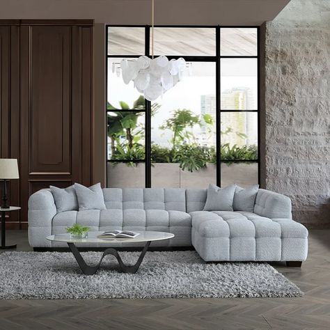 Tribeca Corner Group in Pearl Boucle Fabric ✨ The Tribeca Corner sofa has been crafted with deep channel stitching, and upholstered in a gorgeous pearl boucle fabric, making the sofa not only an eye-catching feature to any home, but a lavishly comfortable place to sit back and relax. A contemporary take on the Chesterfield design, the bold silhouette paired with the soft curves of the Tribeca Range expertly harmonises modern luxury with timeless opulence. Designed for comfort and durability... Pearl Sofa, Family Sofa, Comfortable Place, Sofa Size, Premium Bedding, Boucle Fabric, Comfort Design, Shared Rooms, Fabric Making