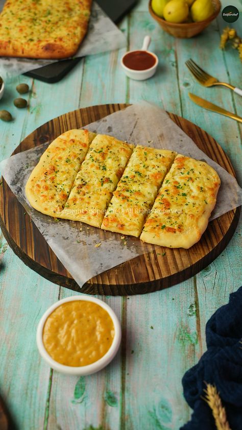 This Cheese Garlic Bread is as easy to make as it looks. Cheesy topping with garlic and honey mayo dip give this garlic bread an appetizing taste and smell. Try out this Cheese Garlic Bread at home and share your feedback with us #CheesyGarlicBread #GarlicBread #CheesyBread #pinterestrecipes #pinterestideas #pinterestworthy #foodphotos #foodpics #foodphotography #foodimages #pinterestinspired #foodstyling #Sooperchef #foodpresentation Cheese Garlic Bread Recipe, Garlic Bread At Home, Bread With Honey, Mayo Dip, Garlic And Honey, Cheese Garlic Bread, Fruit Desert, Bread At Home, Garlic Cheese Bread