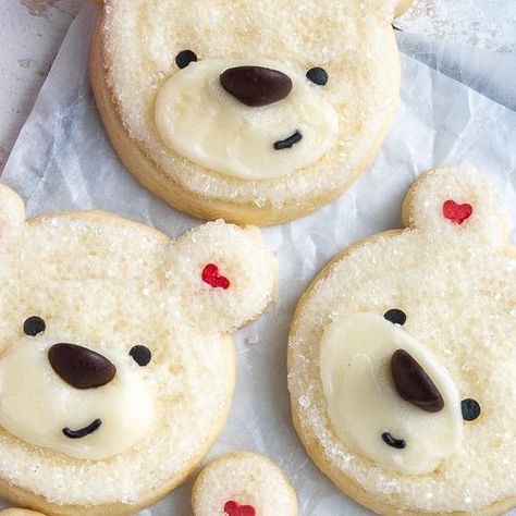 Chelsey White on Instagram: "✨Polar Bear Cookies✨ These adorable cookies are surprisingly easy to make! They’re frosted with buttercream & dunked in sanding sugar so you don’t have to worry about getting the frosting super smooth, and the face is made with sprinkles & chocolate chips ☺️ The recipe is linked in my bio or you can google chelsweets polar bear cookies #polarbear #cookies" Polar Bear Oreo Cookies, Christmas Bear Cookies, Valentine Cookies Decorated Buttercream, January Cookies, Rockstar Cookies, Bear Sugar Cookies, Christmas Decorated Cookies, Polar Bear Cookies, Valentine Cookies Decorated