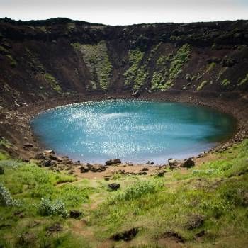 This is the scene of a lake inside a volcano. Oftentimes, when visiting other countries you will notice both inactive and active volcanoes that spew lave every few minutes. Here, however, you will notice a lake and not lava in the crater of the volcano. Inactive Volcano, Active Volcano, Other Countries, Volcano, Iceland, Mother Nature, You Can Do, Places To Go, The Top