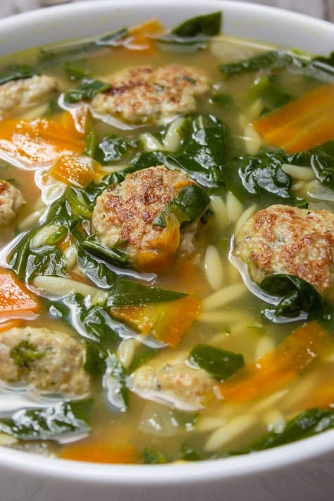 Wedding Soup is a delicious combination of meatballs, orzo, chicken broth and vegetables that comes together for a hearty, comforting meal-in-a-bowl. This one is kicked up with lemon zest. Meals Under 400 Calories, Wedding Soup Recipe, Chicken Meatball Soup, 400 Calorie Meals, Chicken Meatball, Honey Lime Chicken, Orzo Soup, Wedding Soup, Meatball Soup