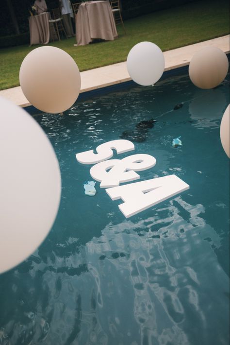 Engagement Party by Modern Party Co. Dallas, TX pool balloons, floating pool letters Pool Welcome Party Wedding, Pool Party Engagement Party Ideas, Wedding Pool Ideas, Engagement Party Poolside, Pool Side Engagement Party, Pool Party Engagement Party, Engagement Party Pool, Coastal Engagement Party, Pool Engagement Party