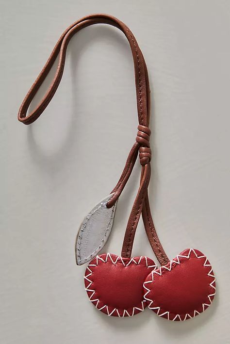 Bead Bag Charm, Leather Bag Charm, Bag Charm Trend 2024, Cherry Silhouette, Bag Charms Aesthetic, Bag Tag Design, Bag Accessories Keychain, Fabric Keychains, Outfits With Purses