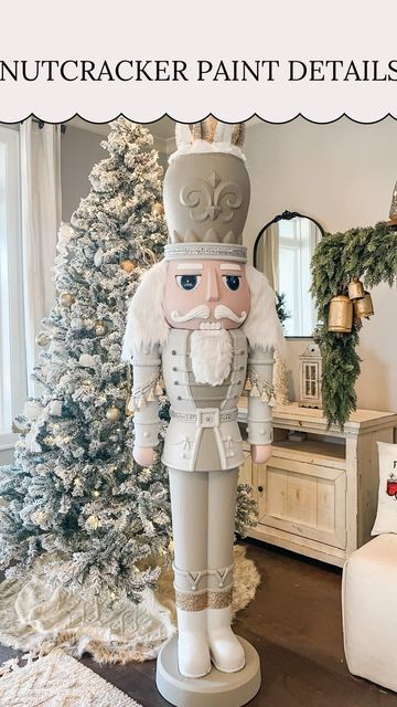 Kelsi Savage|| DIY + HOLIDAYS on Instagram: "🎄Nutcracker Paint Details🎄 ⁣ ⁣ Sharing some details on how I painted our giant nutcracker! The shimmer crystals are my favorite and now I want to use them on my entire house!⁣ ⁣ Paint colors: “passive” & “intellectual grey” by valspar⁣ Paint shimmer: Valspar Paint Crystals .⁣ .⁣ .⁣ .⁣ #diy #nutcracker #diychristmas #diychristmasdecor #christmasdecor #diychristmasdecorations #christmasdecorations #christmasdiy #christmas" Diy Outside Nutcracker, Holiday Time 75 Inch Nutcracker, Tall Nutcracker Christmas, Holiday Time Nutcracker Makeover, Winter Wonderland Nutcracker, Outdoor Nutcracker Decorations, How To Make A Giant Nutcracker, Neutral Color Nutcracker, Nutcracker Suite Christmas Tree