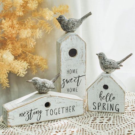 PRICES MAY VARY. Spring Farmhouse Style: These three wooden birdhouse-shaped table decors are designed to infuse a touch of spring farmhouse style into your home, bringing a fresh and welcoming vibe. Distressed Whitewashed Finish: Each piece features a distressed whitewashed finish, imparting a rustic charm that enhances the overall aesthetic, creating a vintage and weathered appearance. Lively Hummingbird Detail: Adding a lively element to the decors, each piece includes a small hummingbird fig Spring Decorating Ideas For The Home, Shabby Chic Birdhouse, Farmhouse Spring Decor, Wooden Table Decor, Birdhouse Ornaments, Wooden Birdhouse, Spring Farmhouse, Spring 2025, Farmhouse Decoration