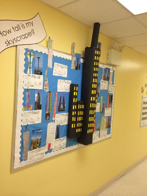 Skyscraper Bulletin Board. Students drew a famous skyscraper and then measured it with inch tiles. Great project for PBL and Math! New York Bulletin Board, New York City Classroom Theme, Skyscraper Presentation Board, Famous Scientists Bulletin Board, Famous Failures Bulletin Board, Preschool Building, Elementary School Bulletin Boards, Science Bulletin Boards, Math Bulletin Boards