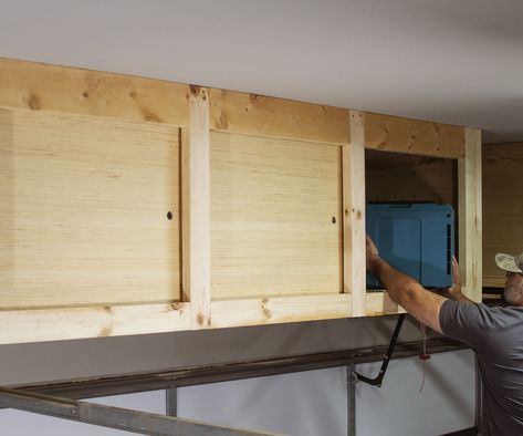 DIY Hanging Storage Shelves With Sliding Doors - Overhead Garage Storage Shelves With Sliding Doors, Wood Block Lamp, Hanging Storage Shelves, Garage Shelves, Overhead Garage Storage, Garage Storage Shelves, Overhead Garage, Diy Garage Shelves, Diy Garage Storage