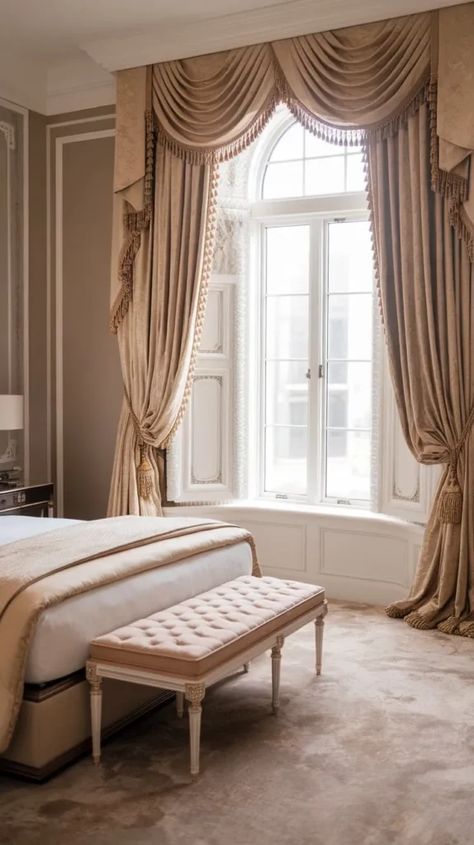 Luxurious swag valance curtains with tassels framing a large window in a grand bedroom with classic furnishings. Curtain Shades, Grand Bedroom, Regal Aesthetic, Chic Curtains, Elegant Drapes, Cozy Ambiance, Luxurious Fabric, Traditional Interior, Light Control