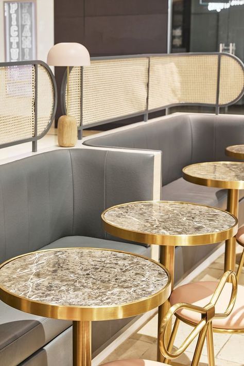 how pleasing is the detail of the dining tables paired with leather banquette seating! so elegant and feminine. Designed by CoLAB Design Studio | LeMille Creperie Photo via @pinterest #interiordesign #interiordecoration #restaurantdining #banquetteseating #brassdetail #blushpink #rattan #elegant #feminine #inspiration #lowernorthshoreinteriordesigners #woodsandwarner Booth Seating Design, Booth Seating Restaurant, Restaurant Seating Design, Restaurant Booth Seating, Corner Booth, Bedroom Seating Area, Restaurant Booth, Seating Design, Design Cafe